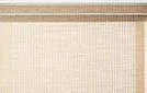 White roller blinds featuring a delicate floral or damask pattern for decorative window styling.